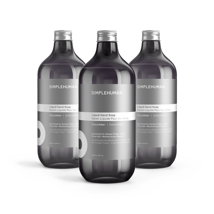 Simplehuman's Cucumber Liquid Hand Soap in 3 charcoal colored bottles and titanium caps.