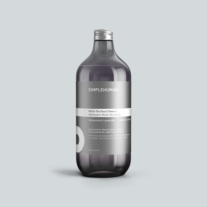 Simplehuman's Watermint Lavender Multi-Surface Cleaner Refill Bottle on a colored background.