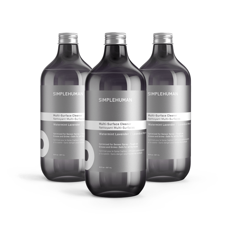 Simplehuman's Watermint Lavender Multi-Surface Cleaner in 3 charcoal colored bottles and titanium caps.