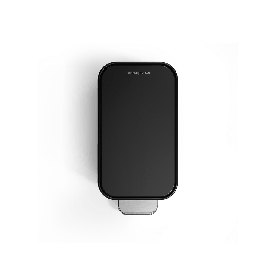 Simplehuman 5L Slim Step Can, Top view, Matte Black, showcasing narrow profile and stainless steel pedal.